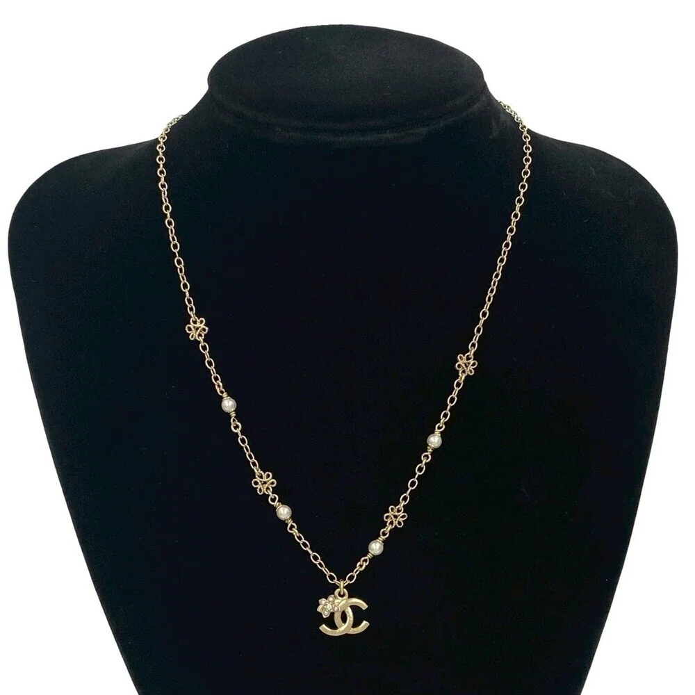 CHANEL Gold Pearl Logo Necklace